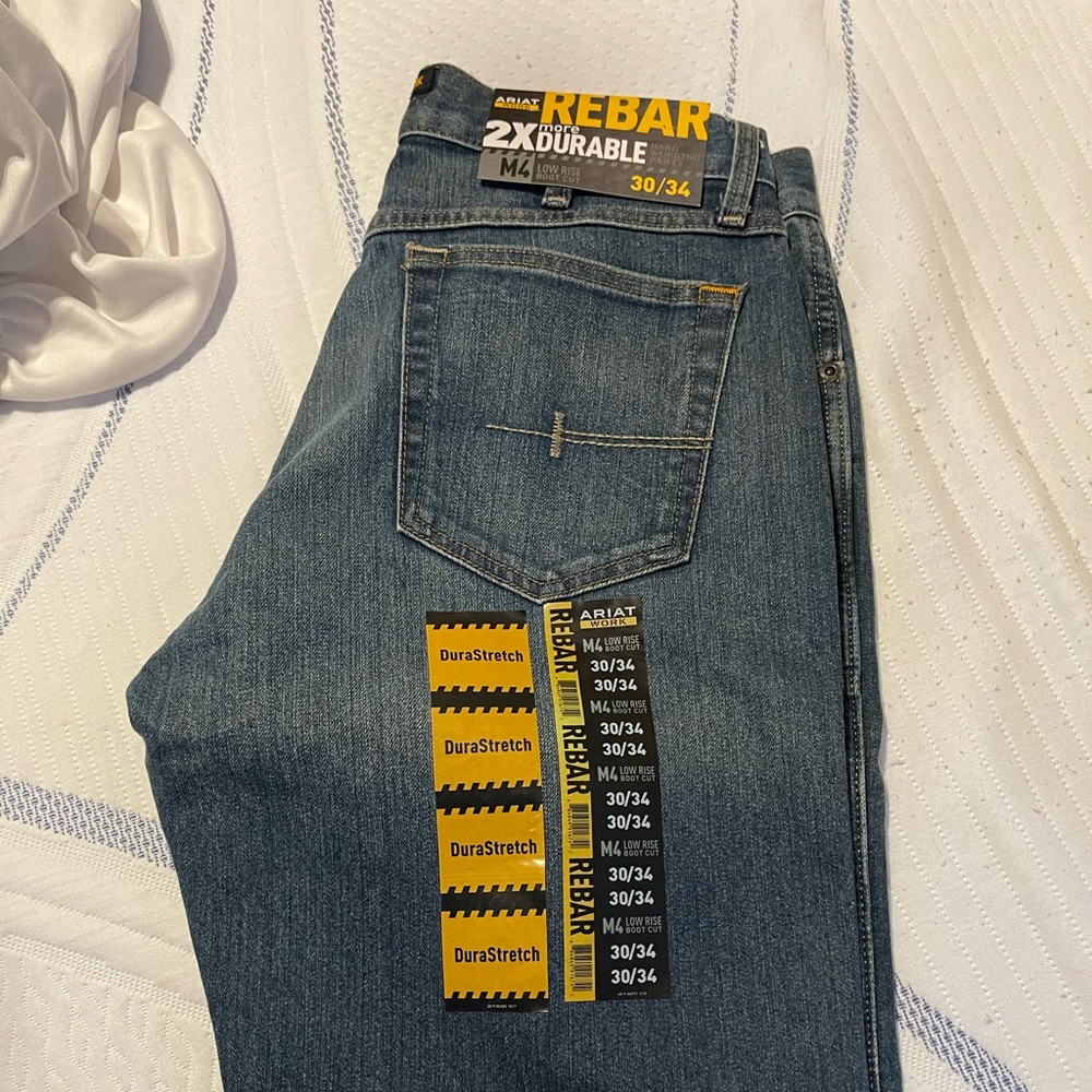 Never worn. Bought for my son and he didn’t like the boot cut.